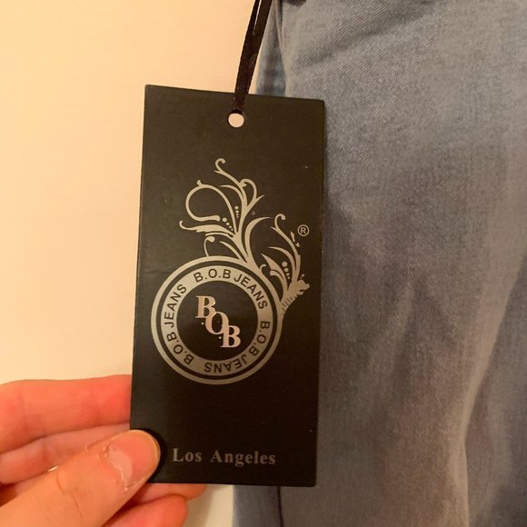 High-Waisted Distressed Jeans - Picture 2 of 4